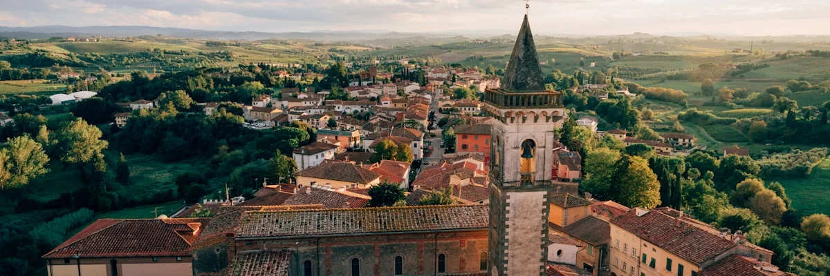 European village rooftops at sunset