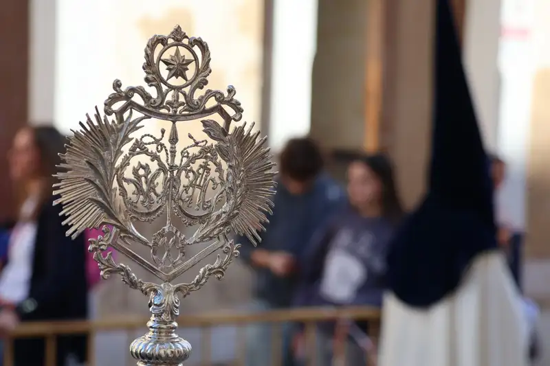 Close-up of an ornate religious symbol during Semana Santa procession in El Puerto de Santa MarĂa, Spain.