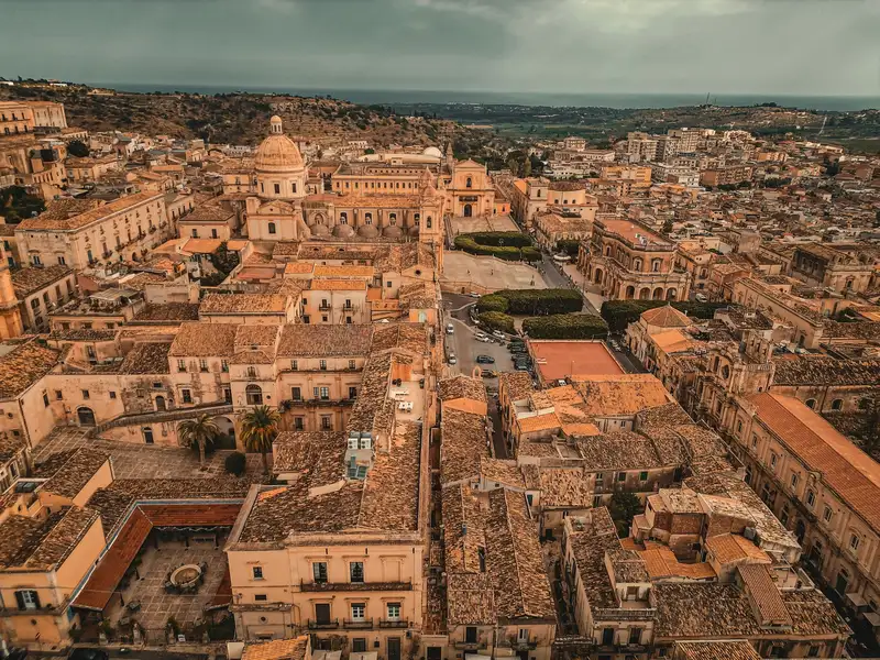 Explore the breathtaking aerial view of Noto's historic architecture in Sicily. A testament to Baroque beauty.
